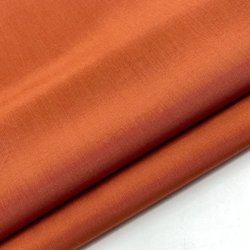 China woven factory weave high density cupro loose-fitting track copper imitation ammonia plain dyed 60% rayon 40% poly fabric