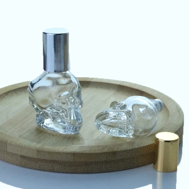 Unique Empty Small 8ml Skull Shape Clear Glass Perfume Essential Oil Roll On Mini Bottle Metal Roller Ball Bottles (NRB37)
