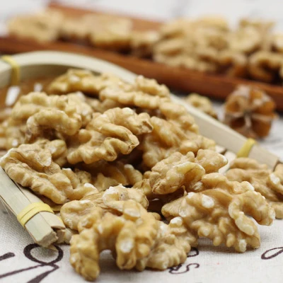Minimum price high quality paper skinned extra light walnut kernels halves walnut supplies