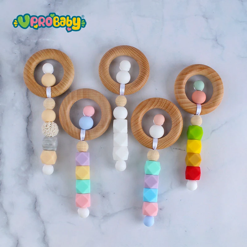 Wholesale High quality BPA free food grade silicone teethers wooden baby silicone teethers and rattles