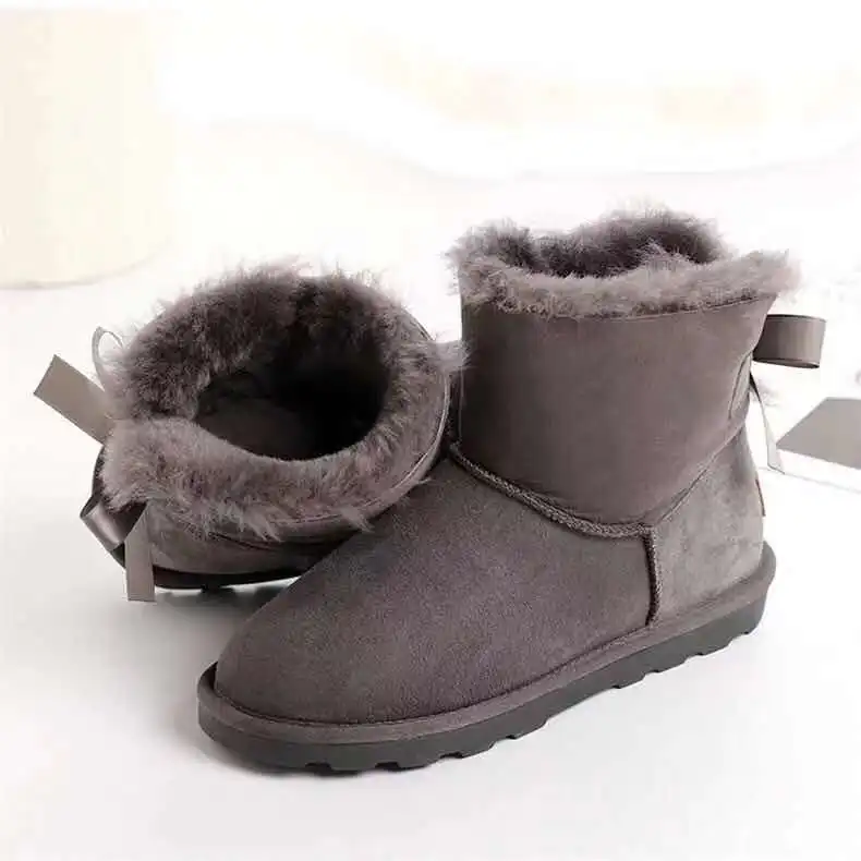 Женские зимние сапоги из коровьей замши с меховой подкладкой и бантом