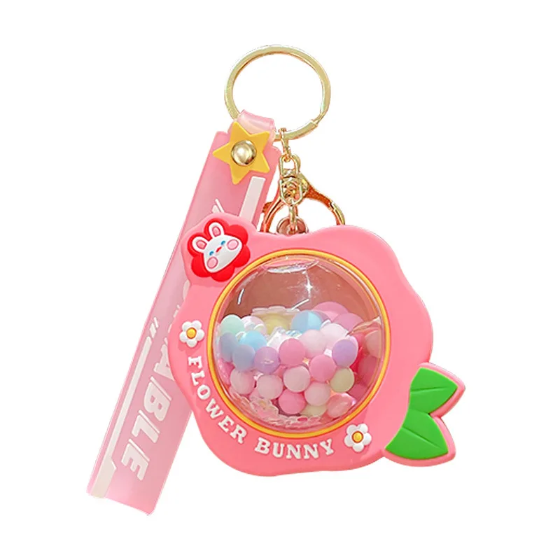 Creative cartoon oil lollipop quicksand bottle key chain wholesale