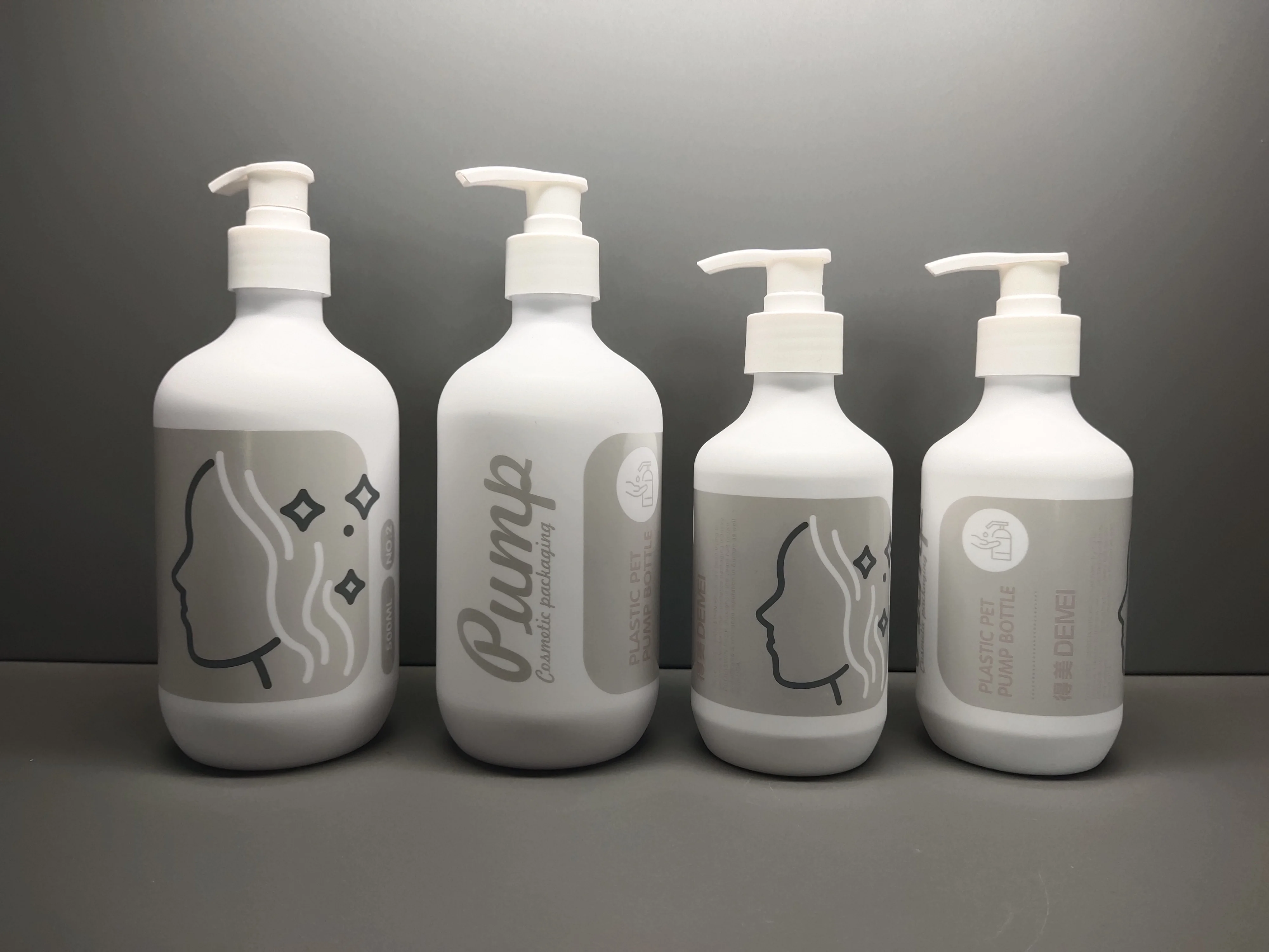 Cosmetic PET Plastic 250ml 300ml Bottle with Silk Screen Printing Stainless Steel 100ml Shampoo Bottle Set Pump Sealing Type