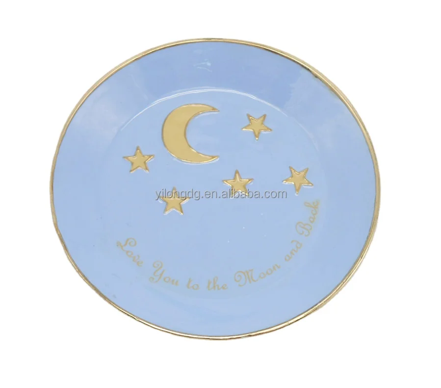 round ring dish with moon and star decoration