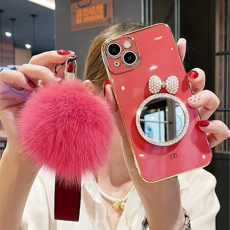 Fashion Luxury Bow Rhinestones Mirror Back Cover Plating TPU Fur Ball hand strap Girls Phone Case for iPhone 13 12 Pro Max
