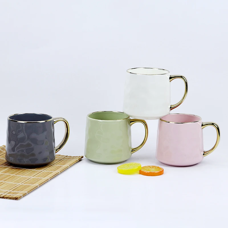 High quality Nordic design new bone china  embossed ball cup color glaze series golden rim and handle  coffee mug