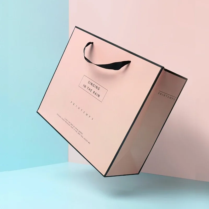 Free Design Custom Logo Matt Pink Paper Clothing Packaging Gift Paper Bag Shopping Bag Luxury Paper Bags With Ribbon Handle