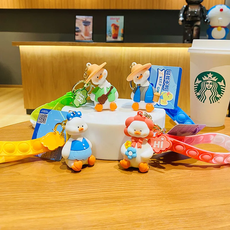 Host sell adorable Animation Comic Duckling Bracelet Wearable Push Poping bubble bracelet Duck Fidget Toy Keychain