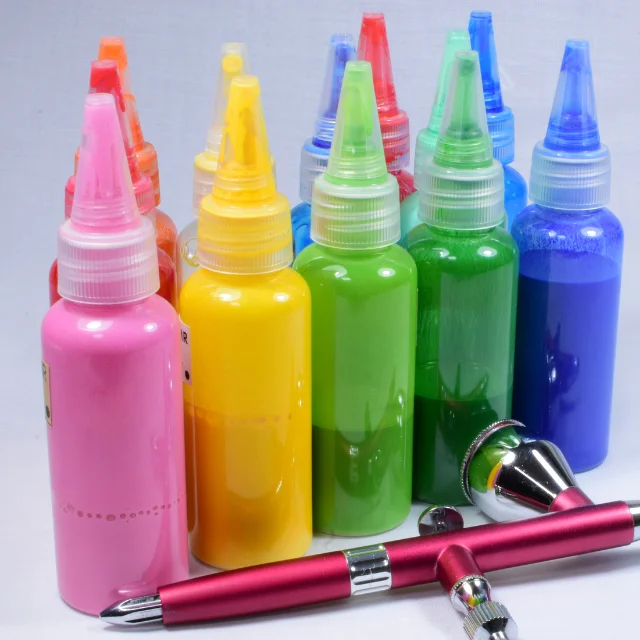 Custom Made Empty Ink Bottle Packaging Squeeze Plastic Cream Bottle With Sharp Mouth Cap
