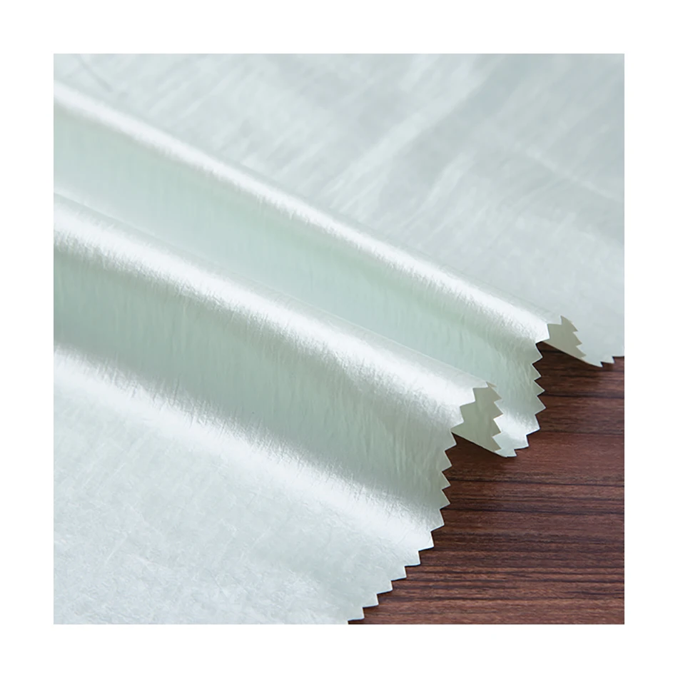
Wholesale Recycled Stretch Nylon Fabric 100% Nylon Stretch Fabric Release paper for Pillow coat Clothing 