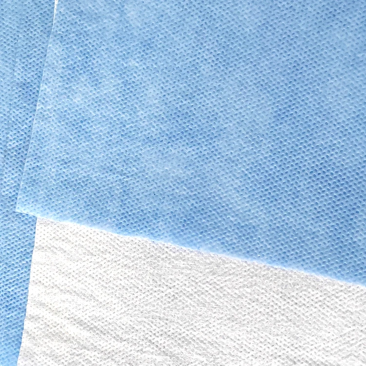 Non woven and breathable film laminated fabric for surgical gown