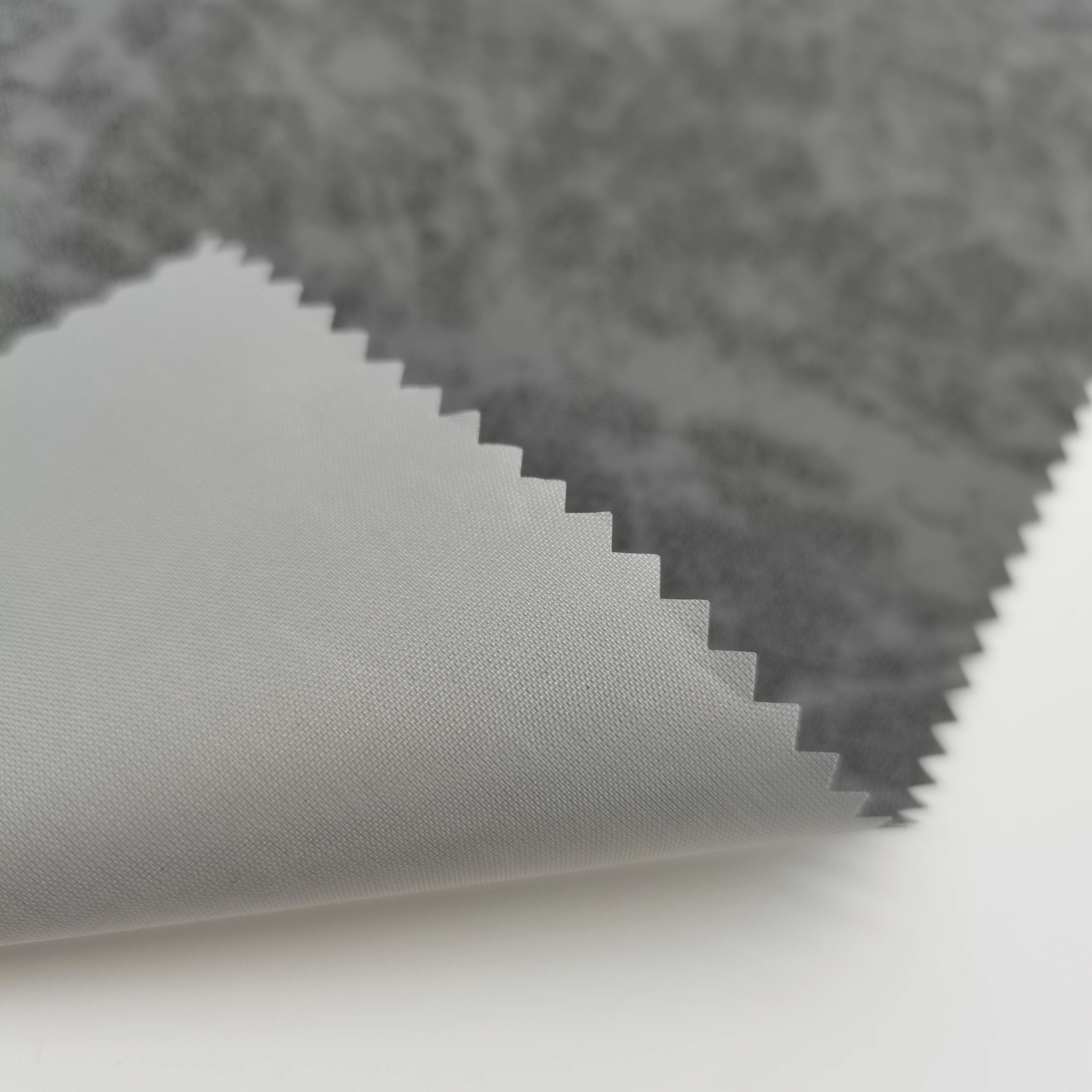 63D*63D100% Polyester Taffeta  with printed reflective coating face