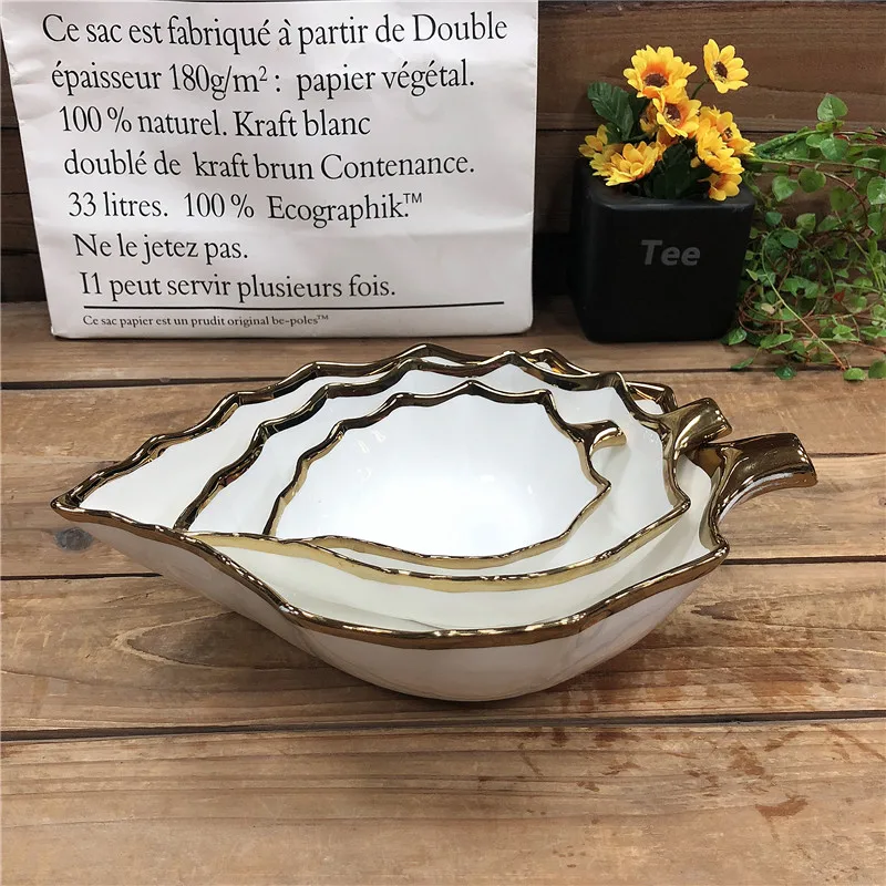 factory custom design leaf shape ceramic bowls with electroplate gold rim decoration for sale