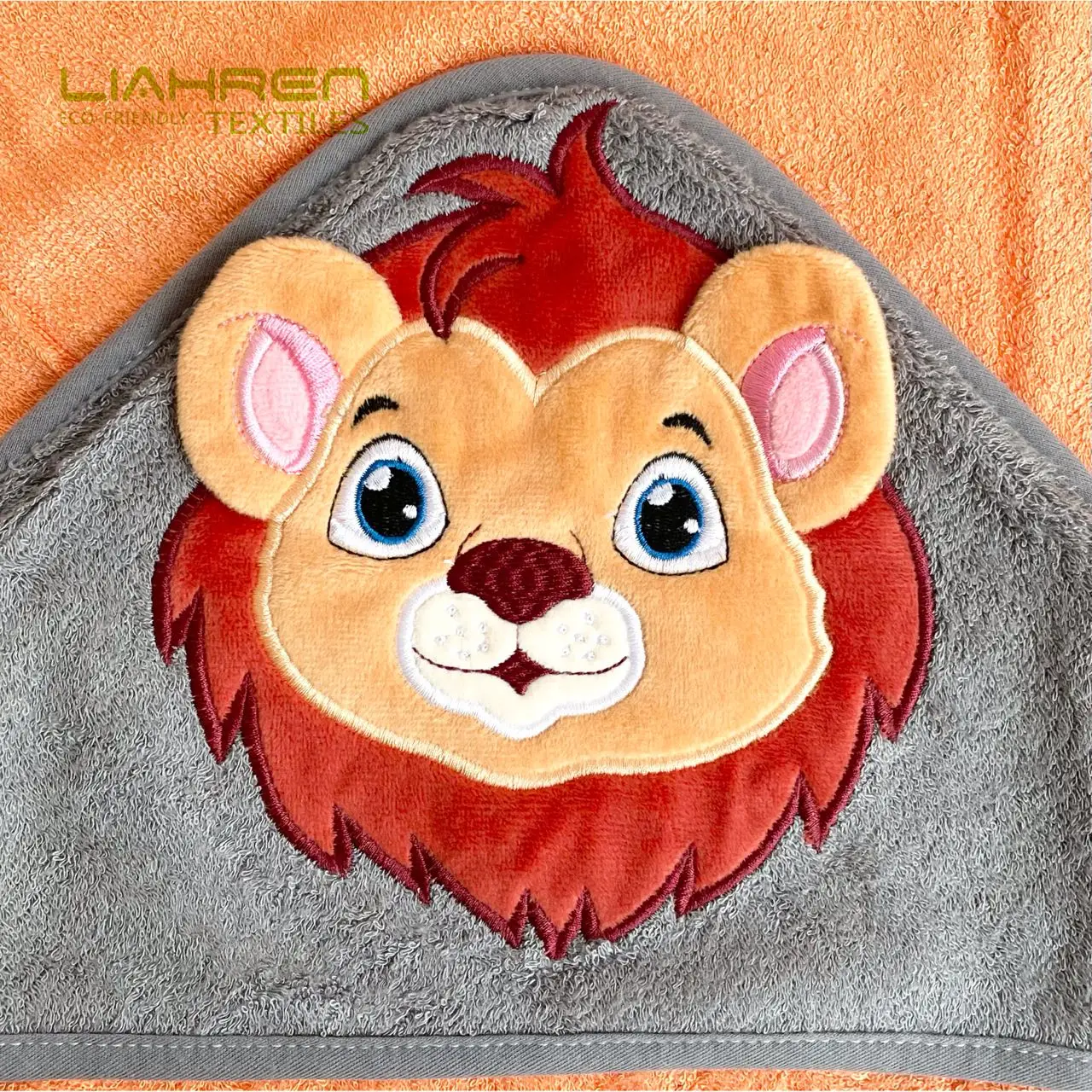 Liahren wholesale 500GSM zipper bag-packed eco-friendly bamboo bath poncho towel lion design bamboo hooded towel for child