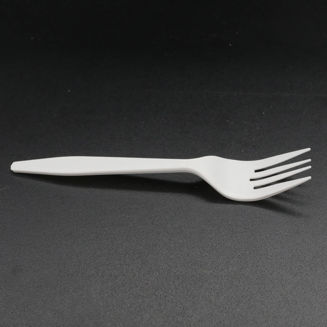 Biodegradable and disposable corn starch spoons and forks