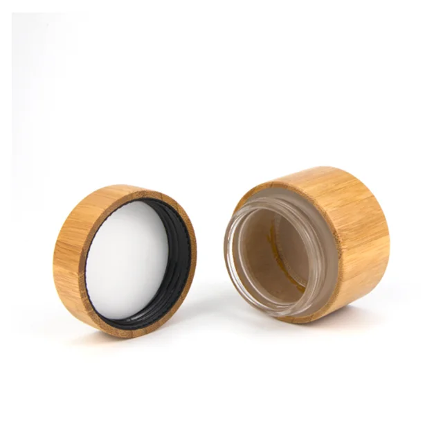 Manufacturer 30ml 50ml 100g 200g 250g Custom Glass Jar Wooden Lid Logo Engraving Jar Lids Bamboo Lid Cosmetic Jar
