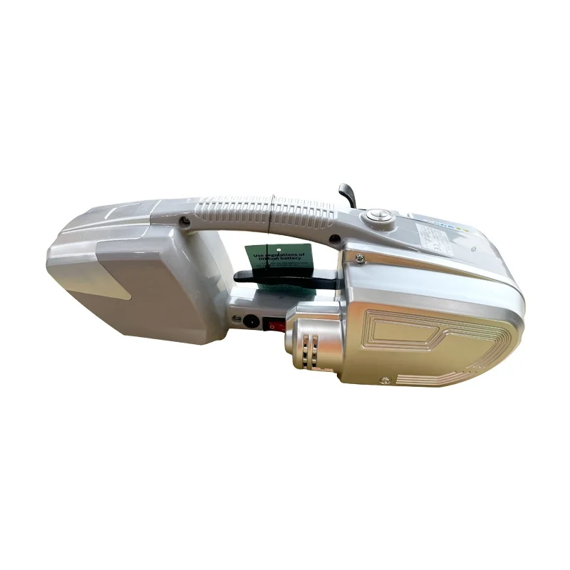 Portable battery powered PET strapping machine