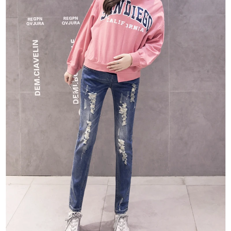 
2020 spring and autumn models pregnant women jeans leggings holes small feet stomach lift pants stretch maternity pants 