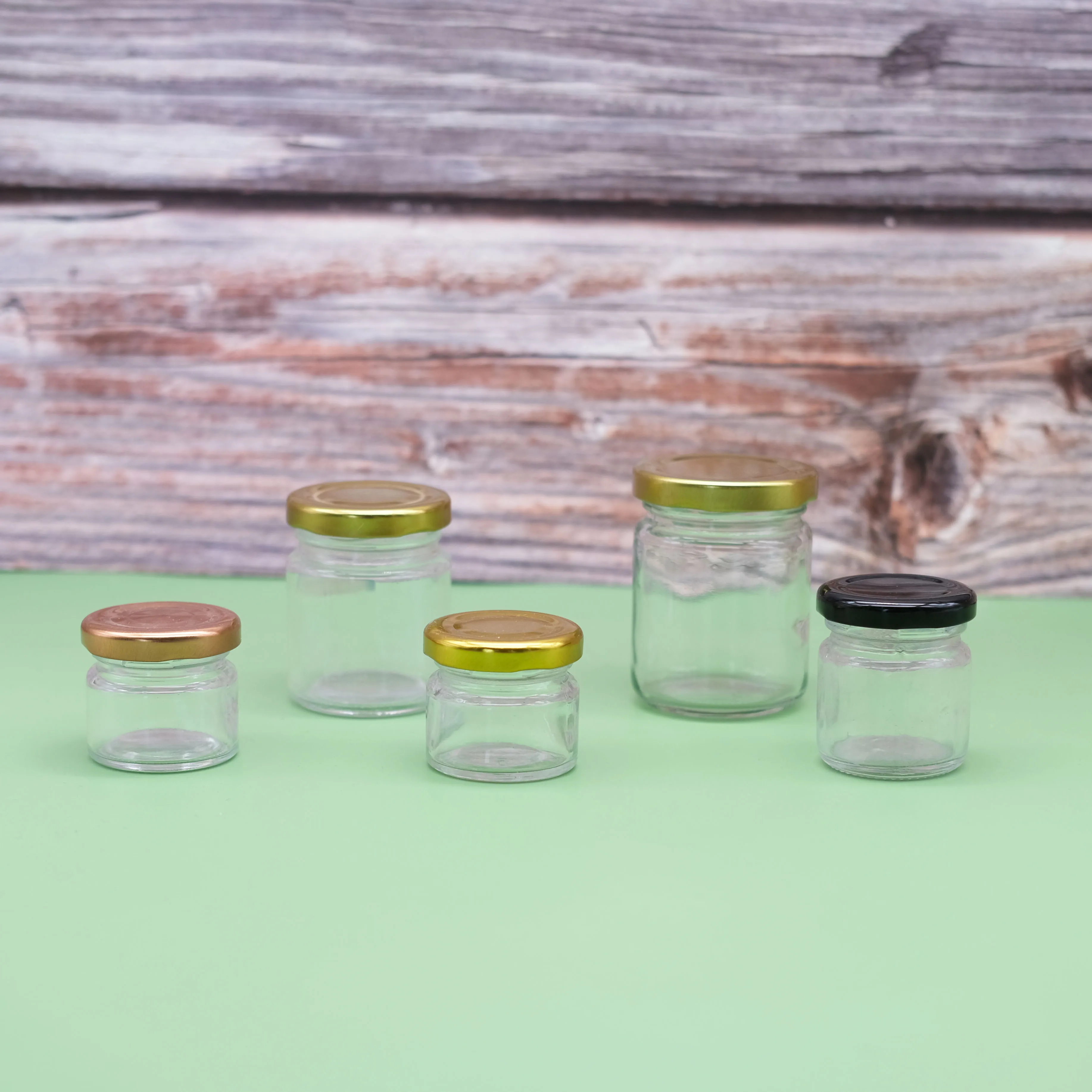 Wholesale mini clear glass jam container with rose golden metal lid 25ml 45ml 80ml  honey glass jars for wedding kids