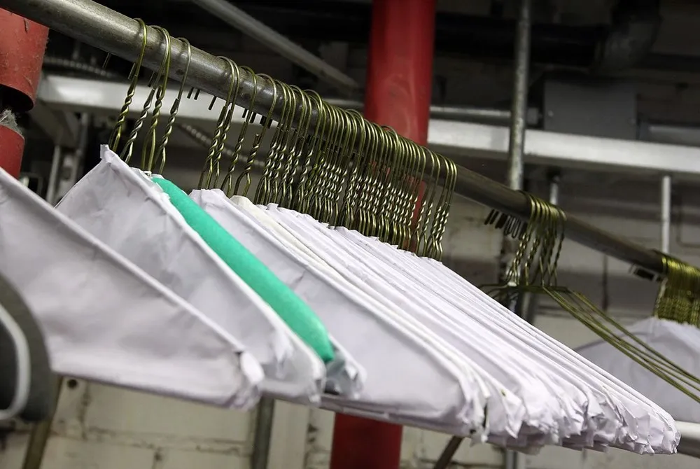 Wire Cape Hangers For Dry Clean We Love Customer Paper Hangers for cloth