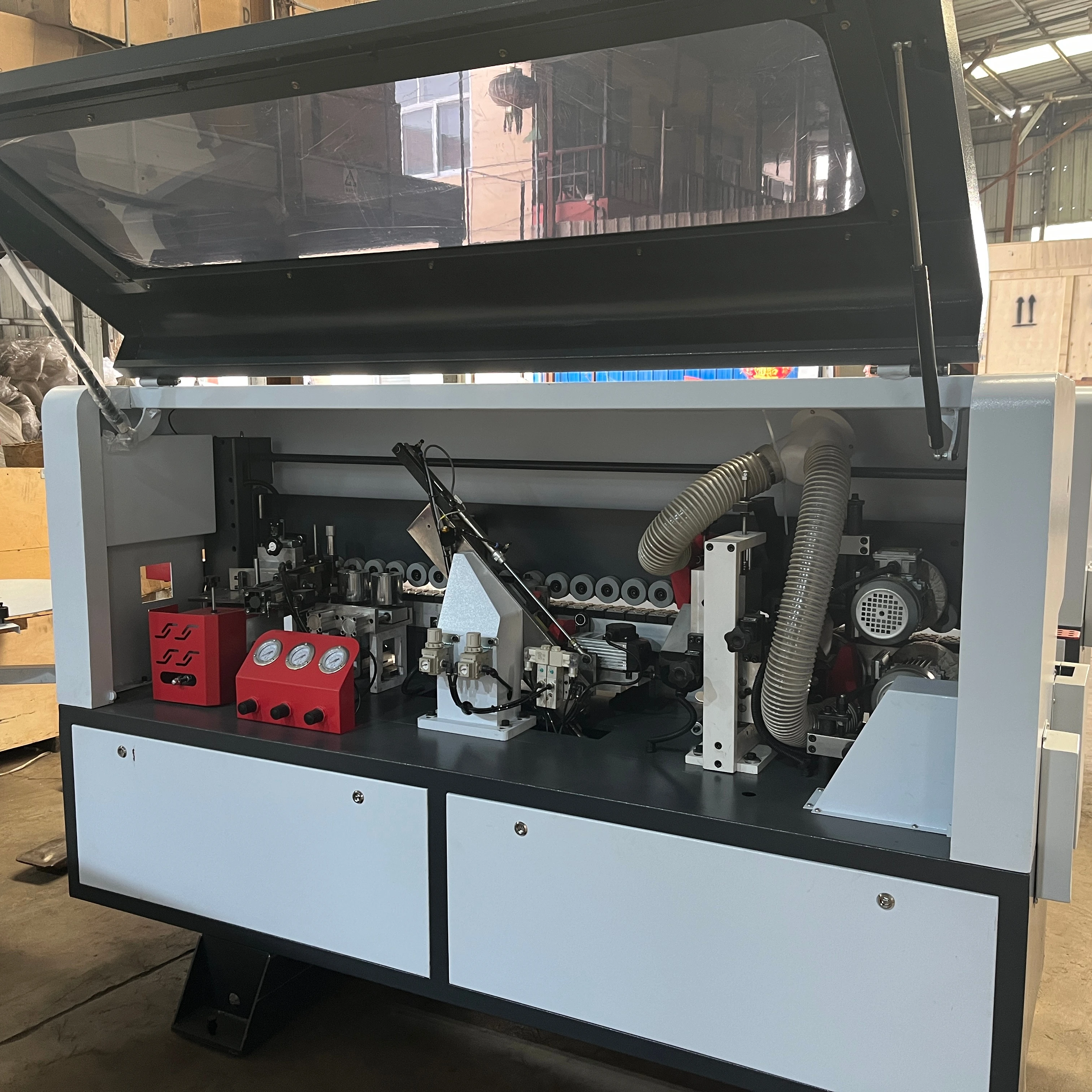 Hot selling fully automatic high-speed medium density fiberboard edge banding machine, four function edge banding manufacturer