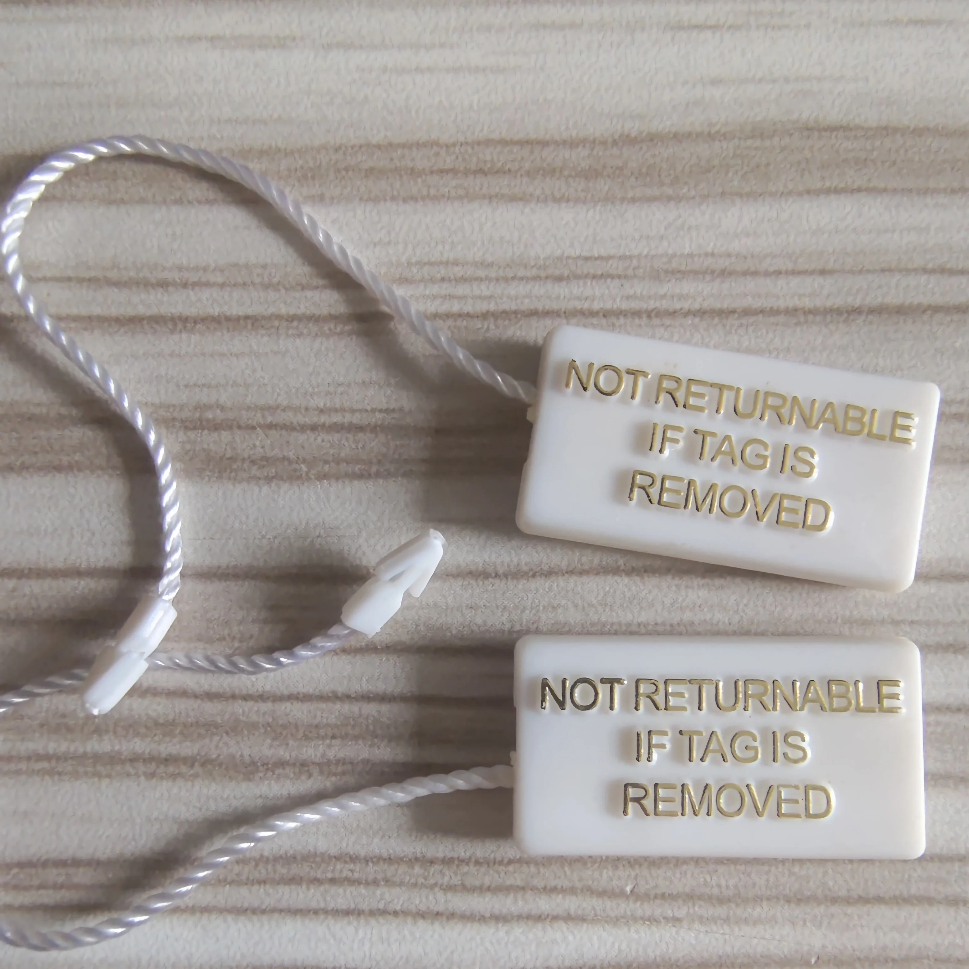 Custom 3D Embossed Jewelry  Disposable Security Seal Lockable Price Plastic Tag String Loop Lock Hanging Tag
