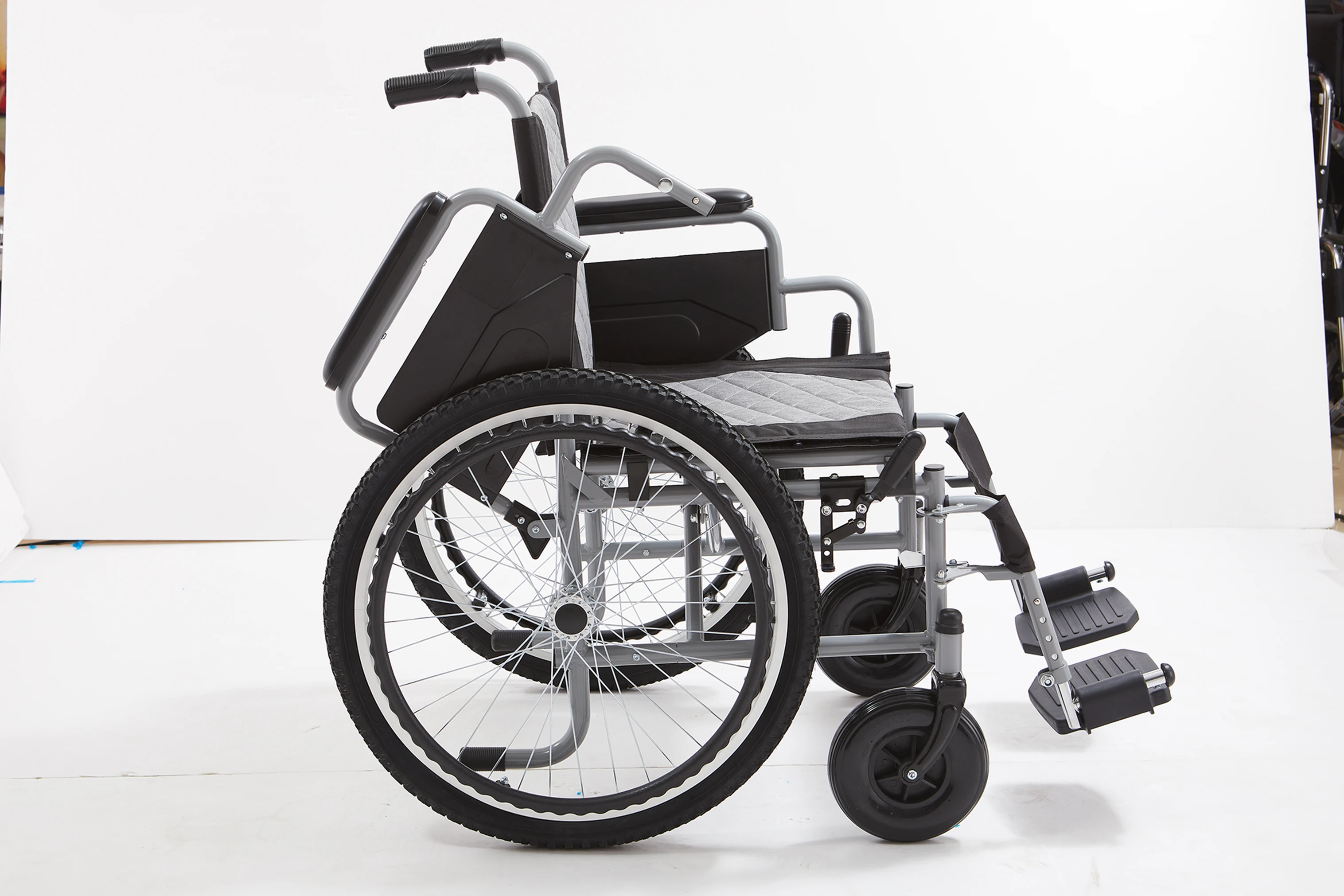 Functional Steel Manual Wheelchair for Elderly with Orthotics Flip Armrests and Detachable Footrest manual wheelchair