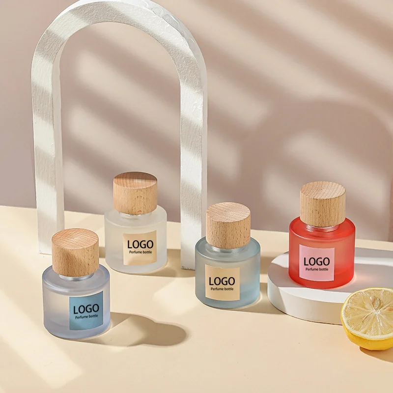 Design Luxury Custom LOGO Fragrance Pump Spray 50ml Round Sprayer Empty Oil Glass Perfume Bottles Packaging