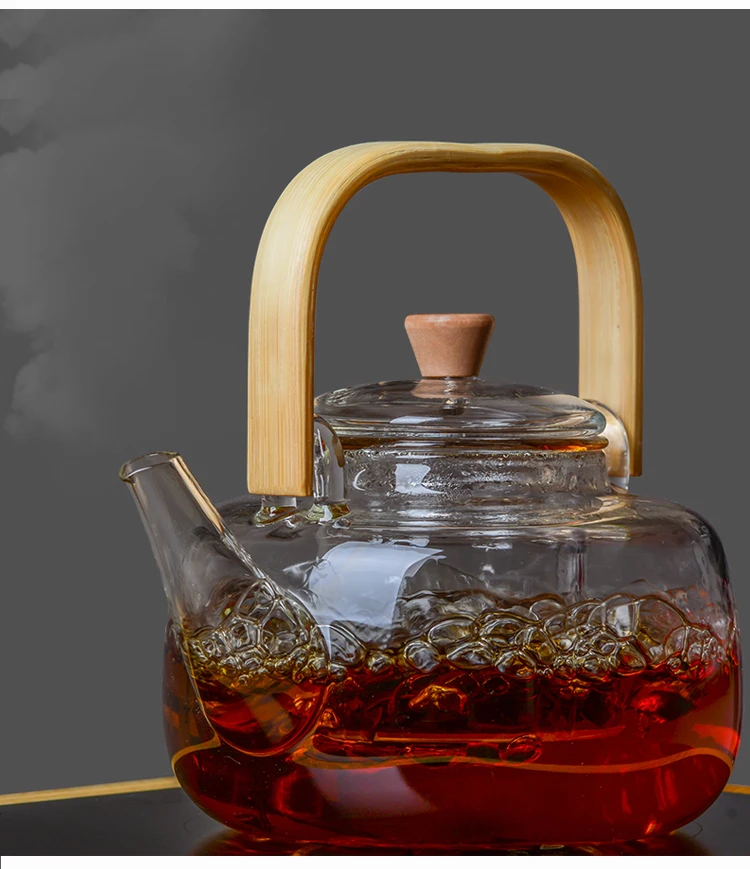 Стеклянный чайник с бамбуковой ручкой, цветущие чайники с листьями