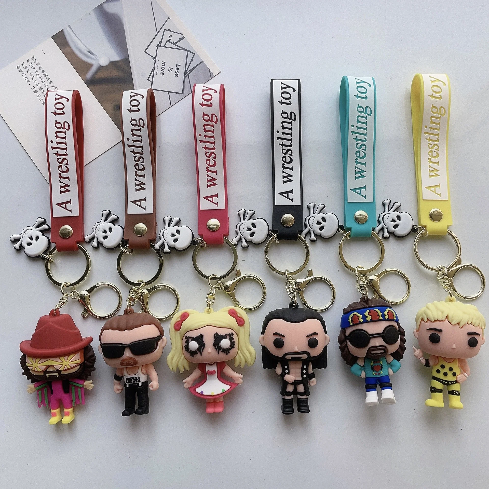 2023 New Arrival Cartoon Wrestling Toy Gladiator Key Chain Creative Bag Car Key Hanging Pendant Keychain