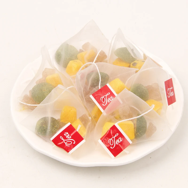 Wholesale Dried  Flavor Tea Pyramid Triangle Tea bag Mixed sweet fruit Kumquat Passion Tea