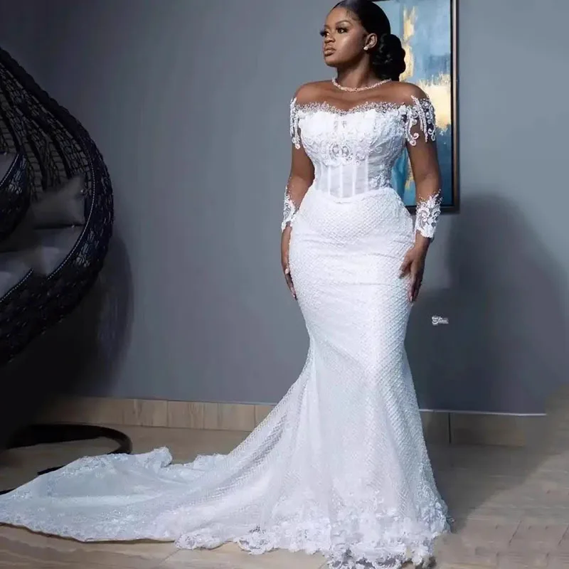 New elegant white trailing wedding dress with waisted fishtail and one shoulder wedding dress