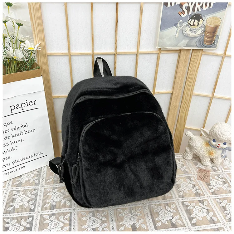 Autumn and winter school bag female plush backpack Korean version high school students solid color simple leisure backpack