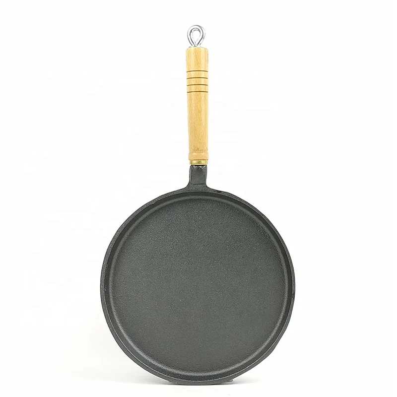 Polished Seasoning a Cast Iron Skillet Camping With Wooden Handle