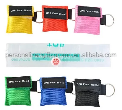 Disposable CPR face breathing masks a nylon pouches with key ring Books- Health  First Aid Disposable CPR Face Shield Masks