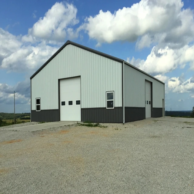 Steel warehouse for a construction site with parapet wall cladding