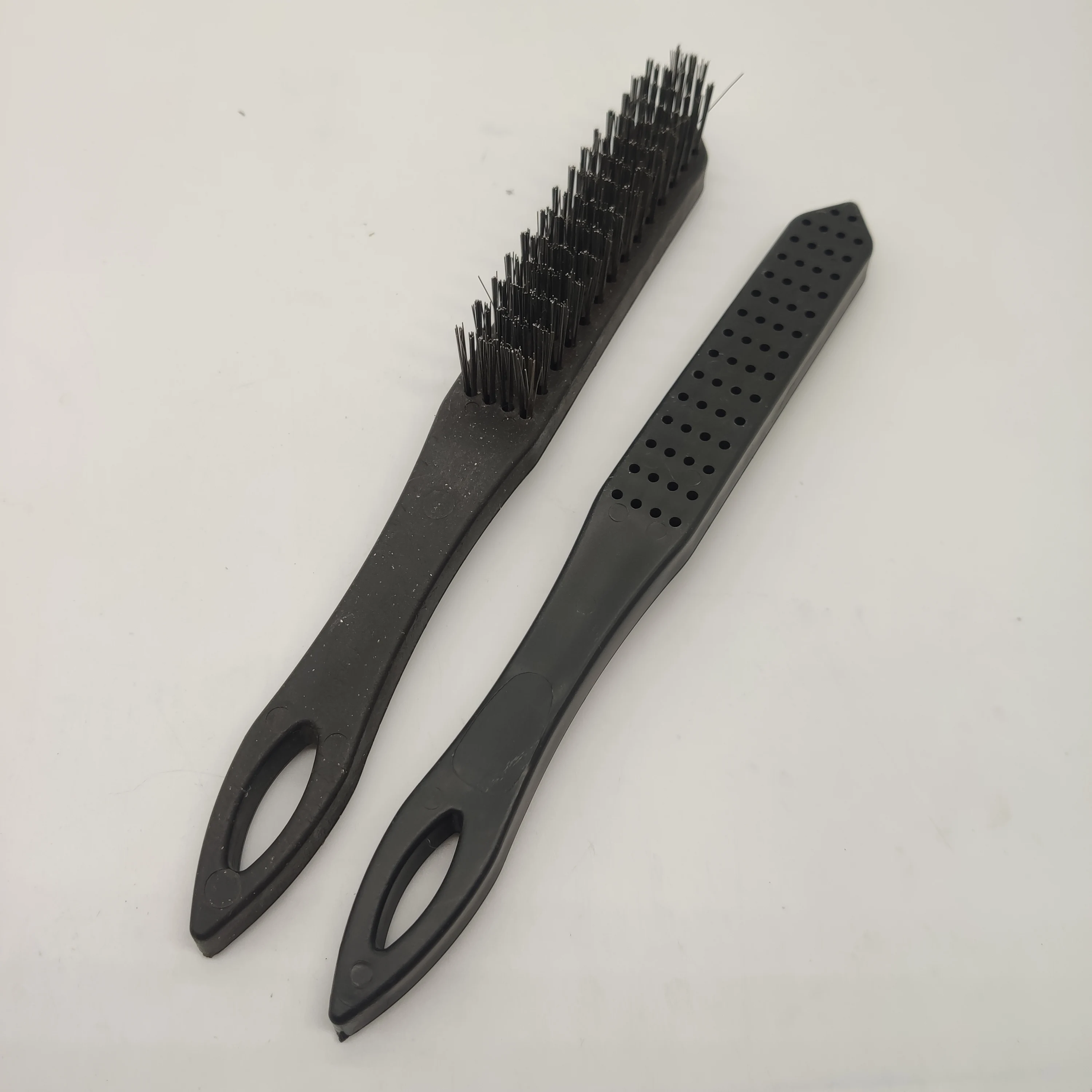 Carbon steel wire brush with black plastic handle for cleaning