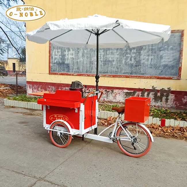 Classic outdoor popcorn truck Electric power There are popcorn three-wheeled bicycles selling food snacks on the street