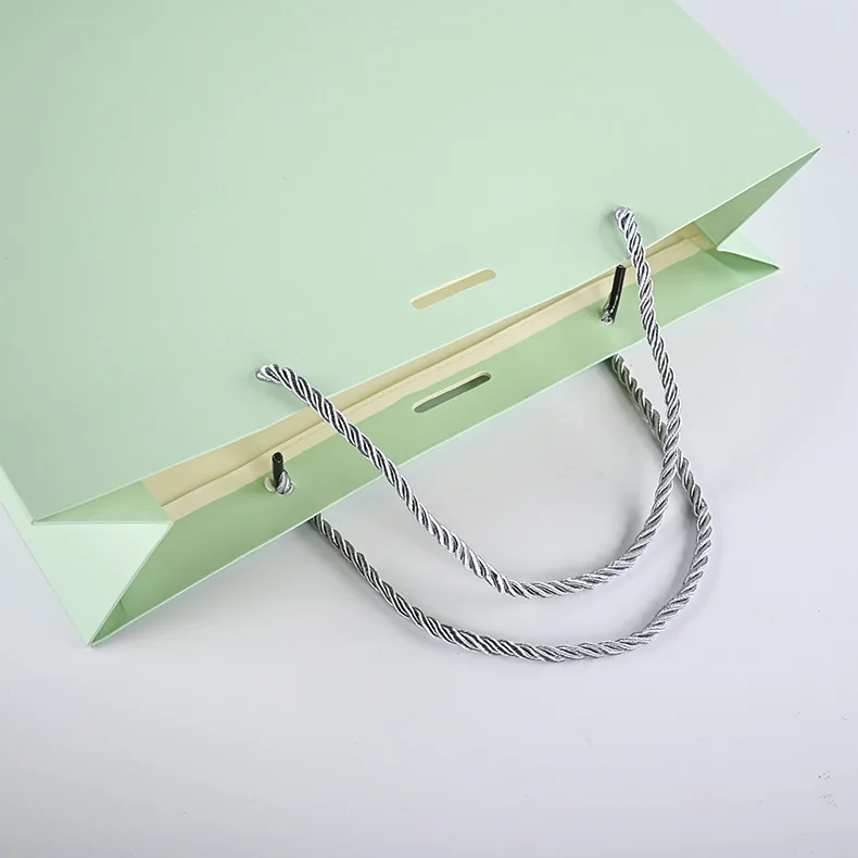 Luxury premium shopping paper bag with your own logo printed packaging de small paper gift bags with ribbon