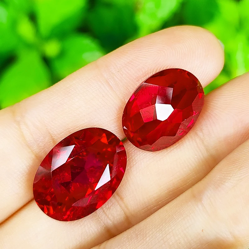 Oval shape natural cut red color synthetic ruby corundum including  minor cracks and inclusions lab created ruby loose stone