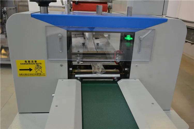 Low price flow pack rice cake horizontal energy bar chocolate packing machines