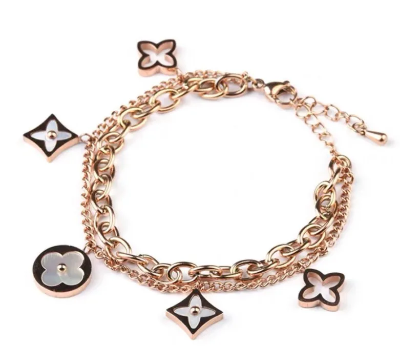
B0052559 Elegant Stainless Steel Lucky Clover Flower shell detail Pendant bracelet lucky four leaves flower charms bracelet 