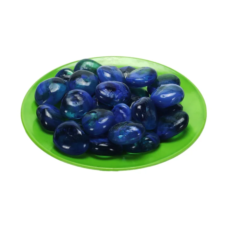 The swimming pool is decorated with garden glass, pebbles, and rain flower stones