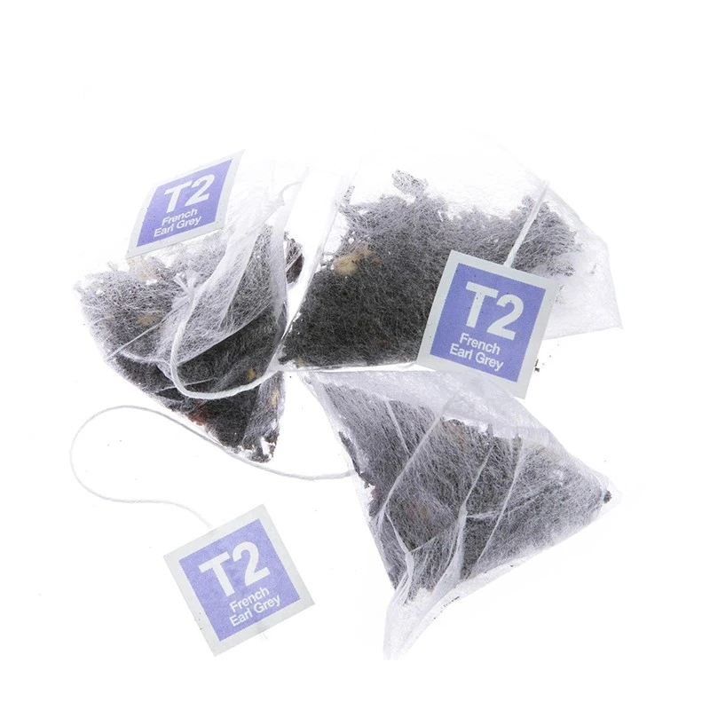 New in 2022 Wholesale Biodegradable Corn Fiber PLA Material Mesh Filter Roll Empty Pyramid Tea Bags Roll