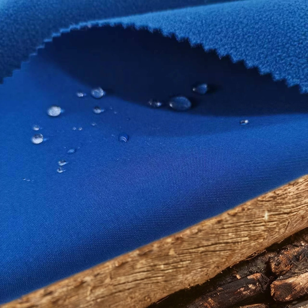 Waterproof Polyester Softshell Fabric Windproof Warm Breathable Outdoor Jacket Ski Wear and Fishing Wear