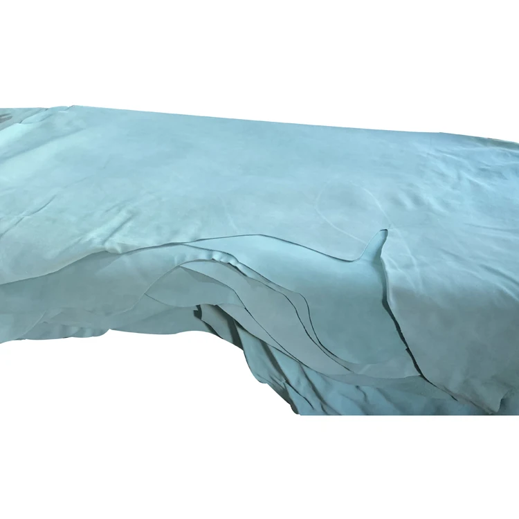 Stock light blue color flat shoes snow boots etc