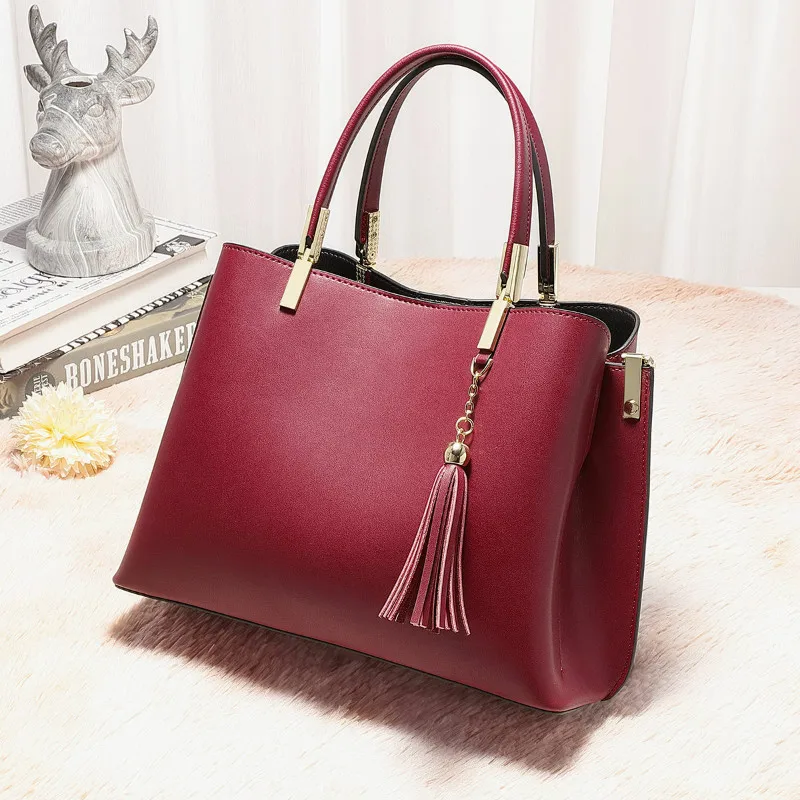 Fashion italian leather handbag oem lady Elegance hand bag tassel purses handbags ladies