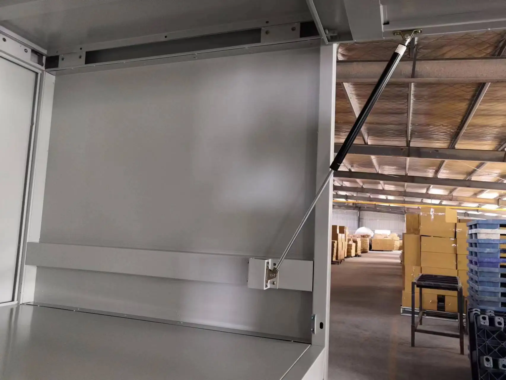 Underground parking lot car storage cabinet over bonnet storage unit