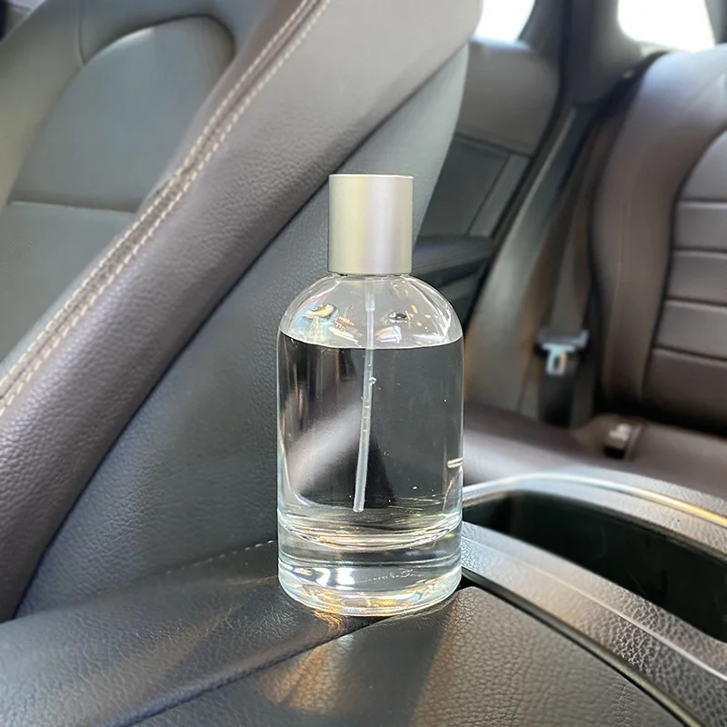 Customized round empty clear perfume glass bottle 50ml 100ml glass spray perfume bottle with metal cap