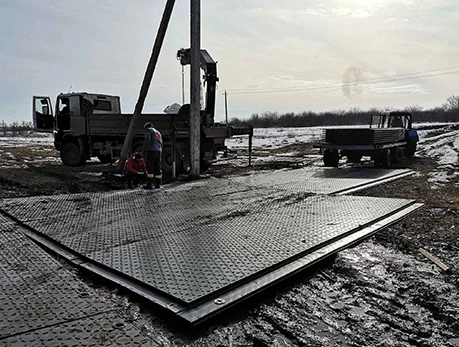 Abosn new design HDPE material overlapping Amphimat temporary ground protection mat